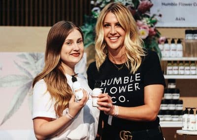 woman posing with Humble Flower Co, product