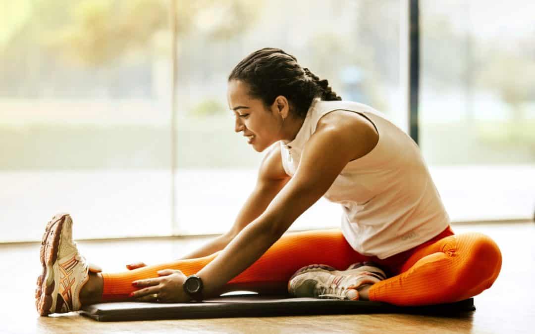 woman stretching during physical activity