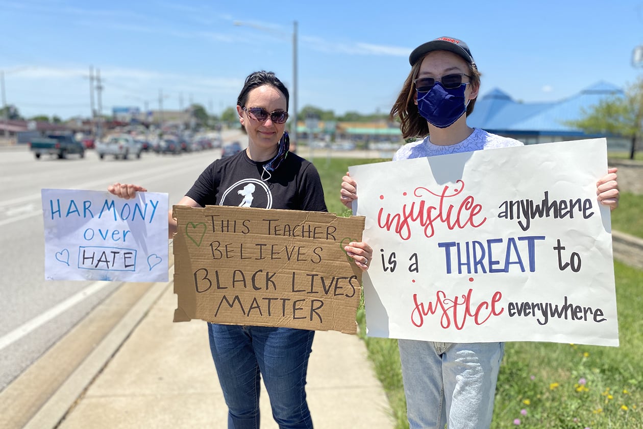 Mother and son protesting